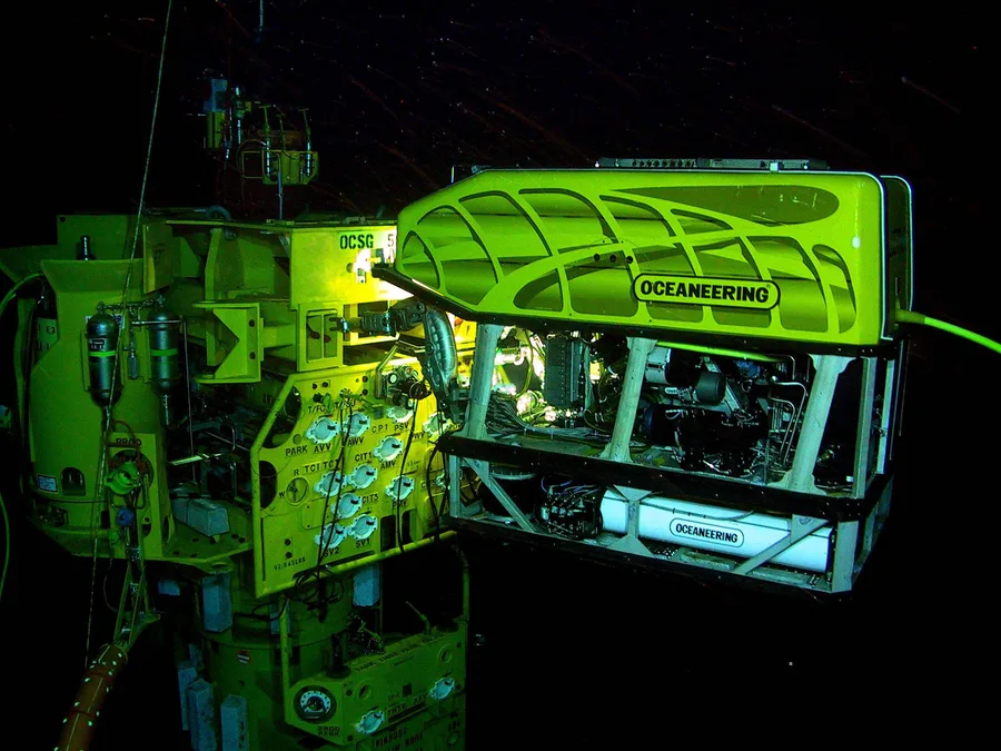 A remotely operated vehicle performing inspection work on a subsea structure
