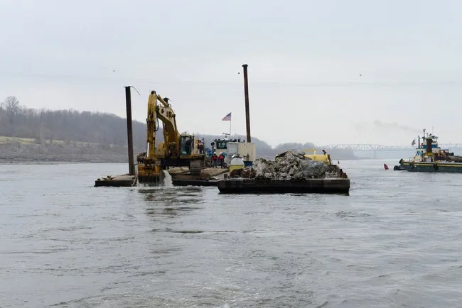 USACE vessels dredging limestone chunks from the Mississippi River during a 2012 drought