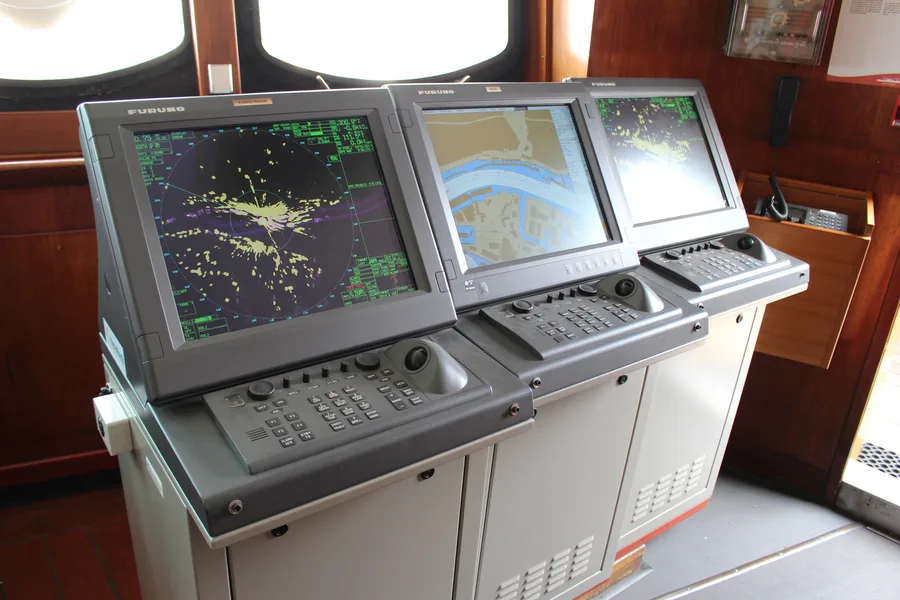 Radar and ECDIS displays on the bridge of the museum ship Cap San Diego